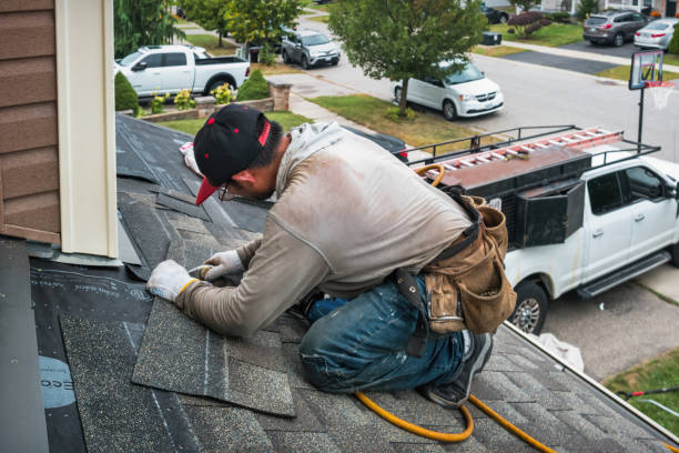 Professional Roof Replacement technician working in Cutler, IN